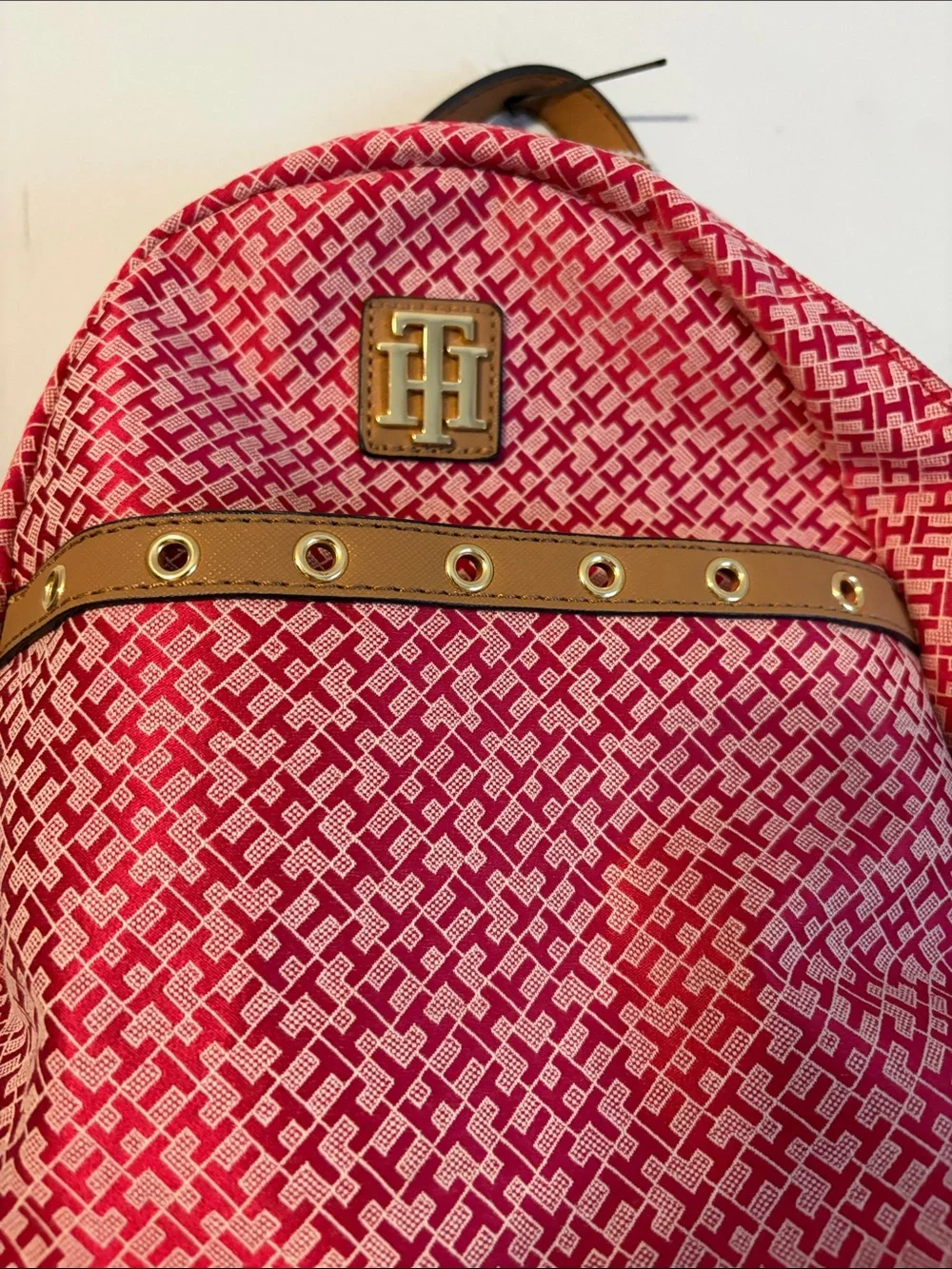 Tommy Hilfiger Red and White Monogram Backpack with Tan Trim.